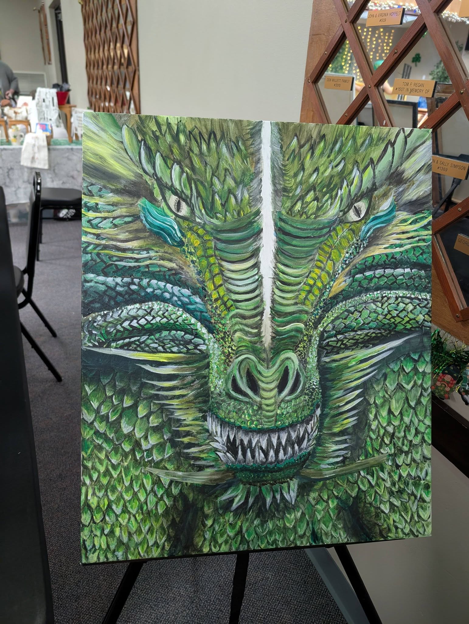 Close up green dragon eye painting