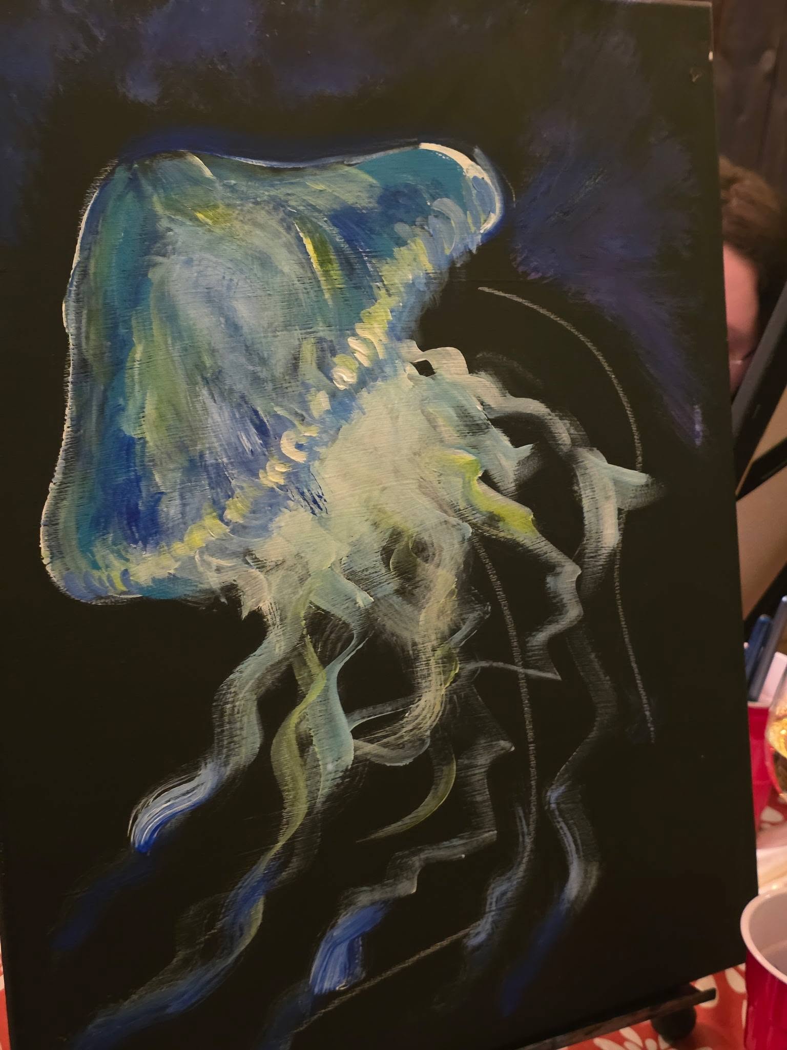 Glowing jellyfish painting on a dark background