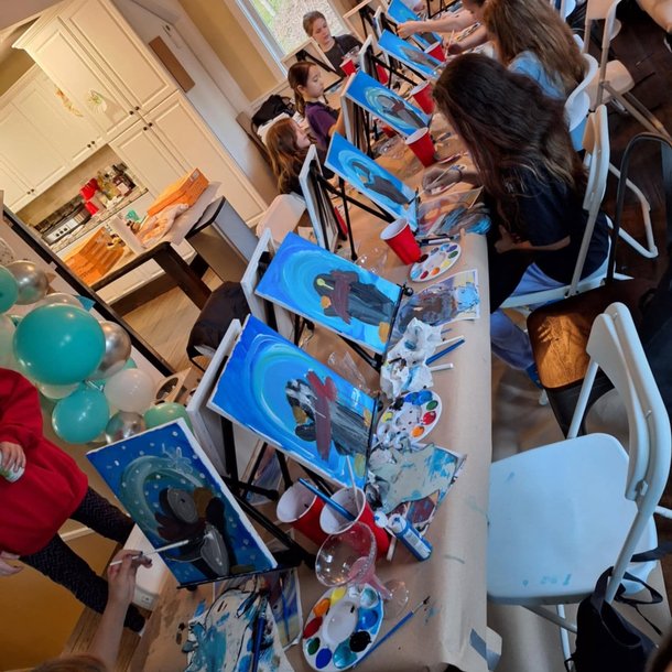 kids painting at a birthday party